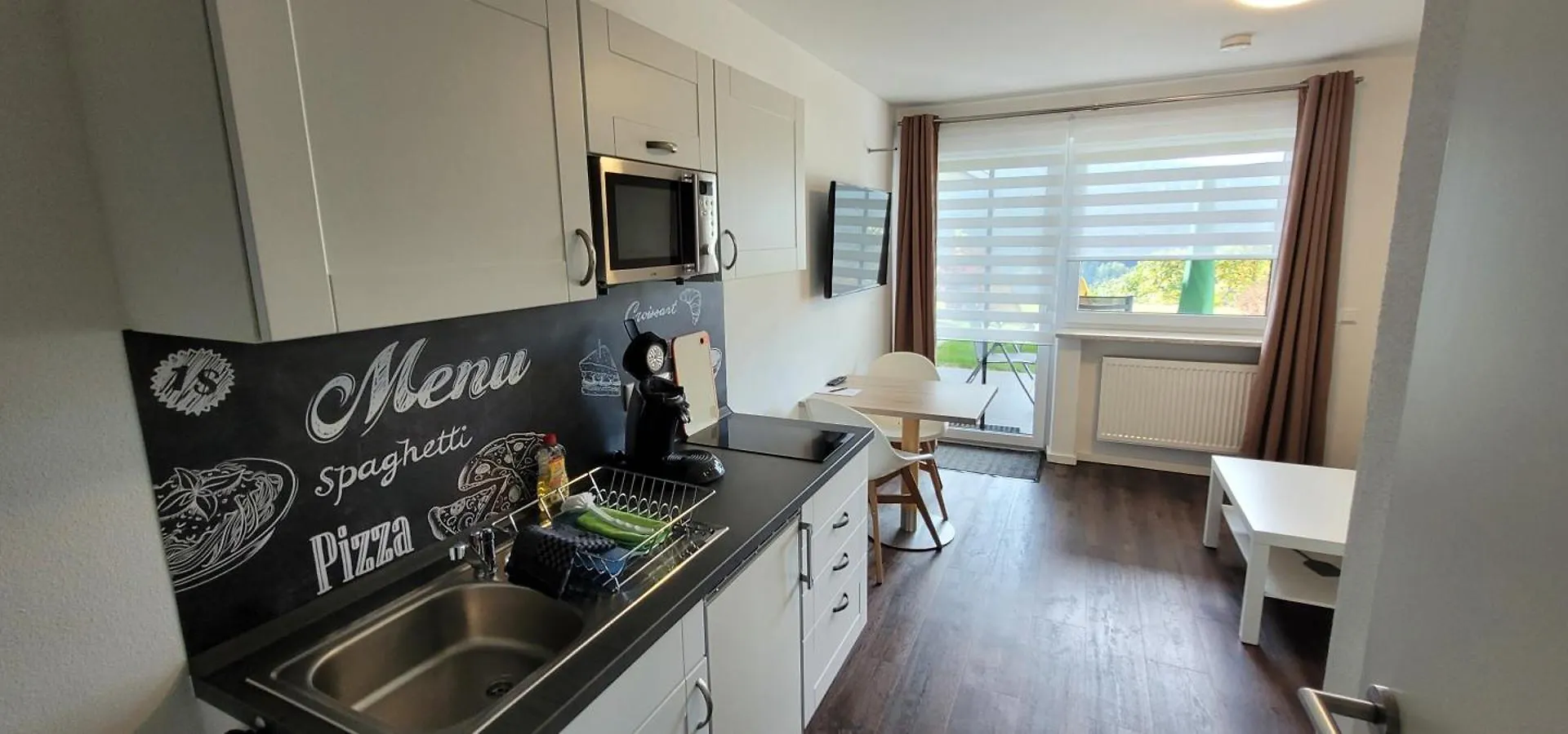 Bayvista Lodge, Apartments Und Studios Lam